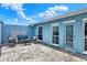 Outdoor patio with furniture and a view of the yard at 304 Westwinds Dr, Palm Harbor, FL 34683