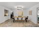 Dining area with modern lighting and rug at 309 Palmetto Ln, Largo, FL 33770