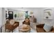 Comfortable living room featuring modern decor, barn doors, and tile flooring at 309 Palmetto Ln, Largo, FL 33770