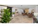 Elegant living room showcasing stylish tile flooring, comfortable seating, and decorative accents at 309 Palmetto Ln, Largo, FL 33770