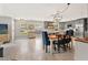 Bright living area with dining table, kitchen view and stylish decor at 3135 W Varn Ave, Tampa, FL 33611