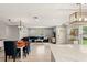 Spacious living area with dining table and stylish furniture at 3135 W Varn Ave, Tampa, FL 33611