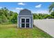A well-maintained shed offers extra storage space in the backyard at 3135 W Varn Ave, Tampa, FL 33611