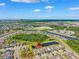 An aerial view of the community with lush landscaping, a pond, and beautiful homes at 315 Blackrock Ln, Apollo Beach, FL 33572