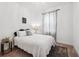 Cozy bedroom featuring a comfortable bed, soft lighting, and warm decor at 315 Blackrock Ln, Apollo Beach, FL 33572