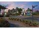 Elegant community entrance featuring lush landscaping and beautiful signage at Mirabay at 315 Blackrock Ln, Apollo Beach, FL 33572
