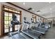 Community gym offers treadmills, ellipticals, and weight machines in a well-lit and spacious workout area at 315 Blackrock Ln, Apollo Beach, FL 33572