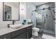 Modern bathroom with sleek vanity, glass-enclosed shower, and contemporary fixtures at 3210 W Horatio St # 9, Tampa, FL 33609