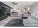 Spacious living area featuring a modern panel wall, open layout, and seamless flow to the kitchen at 3210 W Horatio St # 9, Tampa, FL 33609