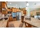 Gourmet kitchen features stainless steel appliances, granite countertops, and custom cabinetry at 33744 Americana Ave, Dade City, FL 33525