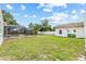 Fenced backyard with pool and detached structure at 3502 King Richard Ct, Seffner, FL 33584