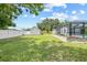Spacious backyard with pool and storage shed at 3502 King Richard Ct, Seffner, FL 33584