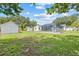 Spacious backyard with pool and detached storage at 3502 King Richard Ct, Seffner, FL 33584