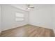 Bedroom featuring a ceiling fan and a window with blinds at 3502 King Richard Ct, Seffner, FL 33584