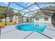 Inviting pool area featuring a screened enclosure for bug-free relaxation at 3502 King Richard Ct, Seffner, FL 33584