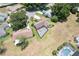 Lovely home featuring a private, screened-in pool and mature landscaping; ideal for outdoor living and entertaining at 37147 Foxrun Pl, Zephyrhills, FL 33542