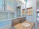 Bathroom featuring a modern sink, a vanity cabinet with granite countertops, and a decorative backsplash at 37147 Foxrun Pl, Zephyrhills, FL 33542
