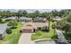 Charming single-Gathering home with lush landscaping and a two-car garage at 37147 Foxrun Pl, Zephyrhills, FL 33542