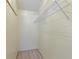 Spacious walk-in closet with metal shelving units at 37147 Foxrun Pl, Zephyrhills, FL 33542