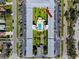An aerial view showcasing this charming condominium complex and parking in a desirable location at 4050 4Th N St # 116, St Petersburg, FL 33703