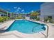 Enjoy the sparkling community pool and jacuzzi with sun loungers at this condominium complex at 4050 4Th N St # 116, St Petersburg, FL 33703