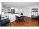 Updated kitchen has plenty of room to eat with an island counter and a small dining table at 4050 4Th N St # 116, St Petersburg, FL 33703