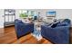 Inviting living room with hardwood floors, stylish furniture, and plenty of natural light at 4050 4Th N St # 116, St Petersburg, FL 33703