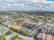 Stunning aerial view showcases the community's architecture and its proximity to the city skyline at 410 S Armenia Ave # 926, Tampa, FL 33609