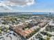 Community aerial view offering a glimpse of the neighborhood pool, colorful buildings, and amenities at 410 S Armenia Ave # 926, Tampa, FL 33609