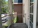 Cozy balcony provides a relaxing outdoor space with views of the surrounding neighborhood and natural landscape at 410 S Armenia Ave # 926, Tampa, FL 33609