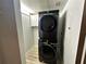 This laundry room features a full-sized, stacked washer and dryer set for convenient laundry access at 410 S Armenia Ave # 926, Tampa, FL 33609