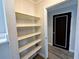 Pantry featuring built in shelves for storage at 410 S Armenia Ave # 926, Tampa, FL 33609