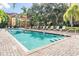 Relaxing pool featuring a large, rectangular pool surrounded by seating for residents to relax and unwind at 410 S Armenia Ave # 926, Tampa, FL 33609