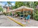 Poolside lounge featuring shaded seating areas for comfortable outdoor relaxation and community enjoyment at 410 S Armenia Ave # 926, Tampa, FL 33609