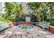 Relaxing community spa area with benches and lush landscaping at 410 S Armenia Ave # 926, Tampa, FL 33609