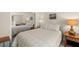 Cozy bedroom featuring a comfortable bed and a mirrored closet at 4213 Arborwood Ln, Tampa, FL 33618