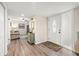 Inviting foyer with wood laminate flooring and decorative accents at 4213 Arborwood Ln, Tampa, FL 33618