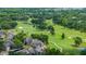 Picturesque view of the golf course integrated with residences and natural beauty at 4213 Arborwood Ln, Tampa, FL 33618