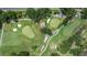 Overhead shot of the golf course featuring sand traps and diverse landscaping at 4213 Arborwood Ln, Tampa, FL 33618