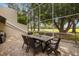 Covered outdoor patio with dining area and scenic views, perfect for al fresco dining and entertaining at 4213 Arborwood Ln, Tampa, FL 33618
