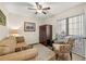 Cozy sitting room with comfortable seating and a large window at 4213 Arborwood Ln, Tampa, FL 33618
