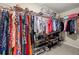 Walk-in closet with ample shelving and hanging space at 4213 Arborwood Ln, Tampa, FL 33618