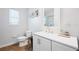 Bathroom featuring gold finishes, tile flooring and a glass shower door at 4521 S Cooper Pl, Tampa, FL 33611