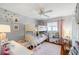 Cozy bedroom with bunk beds, playroom, and hardwood floors at 4521 S Cooper Pl, Tampa, FL 33611