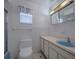 Functional bathroom with bathtub, sink, and medicine cabinet at 5004 S Hesperides St, Tampa, FL 33611