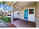 Cozy front porch with stone accents, providing a welcoming entrance to the home at 5004 S Hesperides St, Tampa, FL 33611