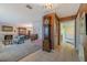 An open living area featuring a dining room, grandfather clock, and tiled flooring at 5004 S Hesperides St, Tampa, FL 33611