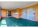 Covered outdoor patio features direct access to the backyard and the home's interior at 5004 S Hesperides St, Tampa, FL 33611