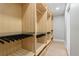 Spacious walk-in closet with custom shelving and drawers offers ample storage for an organized wardrobe at 521 51St S Ave, St Petersburg, FL 33705
