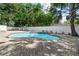 Backyard pool with brick paver deck and lush greenery at 521 51St S Ave, St Petersburg, FL 33705